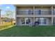 Two-story home with lake view and balconies at 470 Lake Shore Pkwy, Davenport, FL 33896