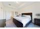 Spacious bedroom with king-size bed and an ensuite bathroom at 470 Lake Shore Pkwy, Davenport, FL 33896