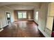 Spacious living room featuring hardwood floors and large windows at 545 Margaret Ct, Orlando, FL 32801