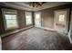 Living room with hardwood floors and ceiling fan at 545 Margaret Ct, Orlando, FL 32801