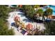 Community playground with play structures and sand at 7400 Oakmoss Loop, Davenport, FL 33837