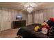King-size bed and large Mickey Mouse plushie at 7400 Oakmoss Loop, Davenport, FL 33837