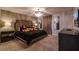 King-size bed with Mickey and Minnie Mouse plushies at 7400 Oakmoss Loop, Davenport, FL 33837