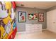 Mickey Mouse themed bedroom with dresser and TV at 7400 Oakmoss Loop, Davenport, FL 33837