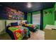 Toy Story themed bedroom with twin beds at 7400 Oakmoss Loop, Davenport, FL 33837