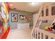 Mickey Mouse themed bedroom with bunk beds and dresser at 7400 Oakmoss Loop, Davenport, FL 33837