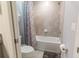 Clean bathroom with shower/tub combo at 7400 Oakmoss Loop, Davenport, FL 33837