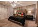 King-size bed with Mickey and Minnie Mouse plushies at 7400 Oakmoss Loop, Davenport, FL 33837