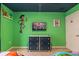Toy Story themed bedroom with TV and dresser at 7400 Oakmoss Loop, Davenport, FL 33837