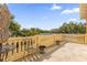 Relaxing balcony overlooking lush landscape and trees at 7440 Aloma Ave, Winter Park, FL 32792