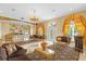 Elegant living room featuring ornate furniture and a marble floor at 7440 Aloma Ave, Winter Park, FL 32792
