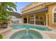 Large pool with spa and outdoor seating area at 7440 Aloma Ave, Winter Park, FL 32792