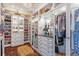 Large walk-in closet with ample shelving and storage at 7440 Aloma Ave, Winter Park, FL 32792