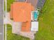 Aerial view showcasing house, pool, and driveway at 7440 Aloma Ave, Winter Park, FL 32792
