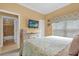 Bedroom with ensuite bathroom and dresser at 7440 Aloma Ave, Winter Park, FL 32792