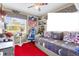Spacious bedroom with a daybed and NFL-themed decor at 7440 Aloma Ave, Winter Park, FL 32792