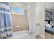 Bathroom with shower and bathtub at 7766 Westland Dr, Kissimmee, FL 34747