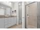 Bathroom features double vanity, shower, and toilet at 7766 Westland Dr, Kissimmee, FL 34747