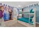 Charming bedroom with a bunk bed and Frozen theme wall art at 7766 Westland Dr, Kissimmee, FL 34747