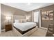 Bedroom with king-size bed and modern decor at 7766 Westland Dr, Kissimmee, FL 34747