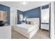 Spacious bedroom with a king-size bed and access to a private balcony at 7766 Westland Dr, Kissimmee, FL 34747