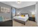 King-size bed, window, and modern nightstands at 7766 Westland Dr, Kissimmee, FL 34747