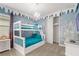 Bunk beds with Frozen themed wall decor at 7766 Westland Dr, Kissimmee, FL 34747