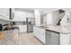 Spacious kitchen featuring stainless steel appliances and granite countertops at 7766 Westland Dr, Kissimmee, FL 34747