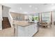 Island kitchen open to Gathering room, granite counters, stainless steel appliances at 7766 Westland Dr, Kissimmee, FL 34747