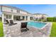 Relaxing pool area, perfect for lounging, with multiple chairs and a spa at 7766 Westland Dr, Kissimmee, FL 34747