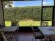 Peaceful screened-in lanai with outdoor seating at 836 Grand Canal Dr, Kissimmee, FL 34759