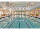 Resort-style swimming pool with plenty of space for relaxation at 836 Grand Canal Dr, Kissimmee, FL 34759