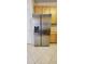 Stainless steel refrigerator in a well-lit kitchen at 836 Grand Canal Dr, Kissimmee, FL 34759