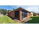 Private screened patio area adjacent to the house at 836 Grand Canal Dr, Kissimmee, FL 34759