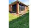 Spacious screened patio with ample yard space at 836 Grand Canal Dr, Kissimmee, FL 34759
