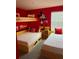 Mickey Mouse themed bedroom with a twin and full-size bed and bunk beds at 8918 Tropical Haven Ct, Kissimmee, FL 34747