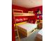 Mickey Mouse themed bedroom with a twin and full-size bed and bunk beds at 8918 Tropical Haven Ct, Kissimmee, FL 34747