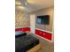 ' bedroom with twin beds and comic book wallpaper at 8918 Tropical Haven Ct, Kissimmee, FL 34747