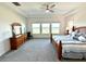 Main bedroom with water views and high ceilings at 16779 Broadwater Ave, Winter Garden, FL 34787