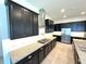 Spacious kitchen with stainless steel appliances and granite countertops at 16779 Broadwater Ave, Winter Garden, FL 34787