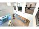 Soaring ceilings and open floorplan showcasing kitchen, living and dining areas at 16779 Broadwater Ave, Winter Garden, FL 34787