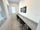 Spacious study with built-in granite countertop workspace at 16779 Broadwater Ave, Winter Garden, FL 34787