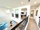 Loft overlooking the main living area with access to bedrooms at 16779 Broadwater Ave, Winter Garden, FL 34787