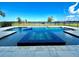 Stunning saltwater pool with spa and lake views at 16779 Broadwater Ave, Winter Garden, FL 34787