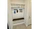 Convenient drop zone with bench seating and cubbies at 16779 Broadwater Ave, Winter Garden, FL 34787