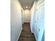 Bright hallway with wood-look flooring at 16779 Broadwater Ave, Winter Garden, FL 34787