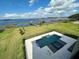 Aerial view showcasing the home, pool, and lakefront property at 16779 Broadwater Ave, Winter Garden, FL 34787