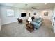 Bright and airy bedroom with neutral carpeting and ample natural light at 16779 Broadwater Ave, Winter Garden, FL 34787