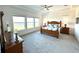 Main bedroom with water views and high ceilings at 16779 Broadwater Ave, Winter Garden, FL 34787