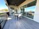 Relaxing covered patio with water views and outdoor dining space at 16779 Broadwater Ave, Winter Garden, FL 34787